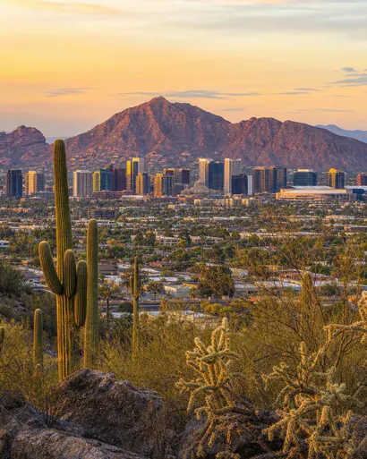 Downtown Phoenix skyline against desert mountains